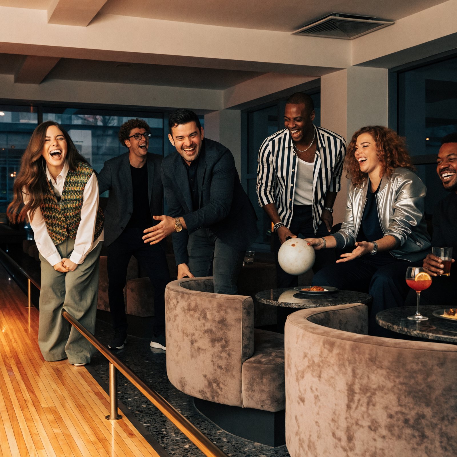 Six people at one bowling lane
